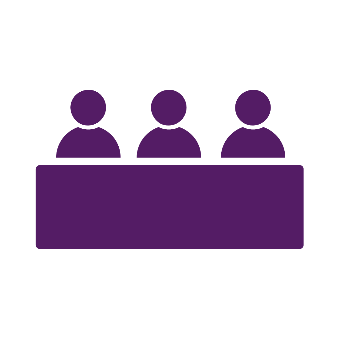 A purple of 3 people sitting for discussion