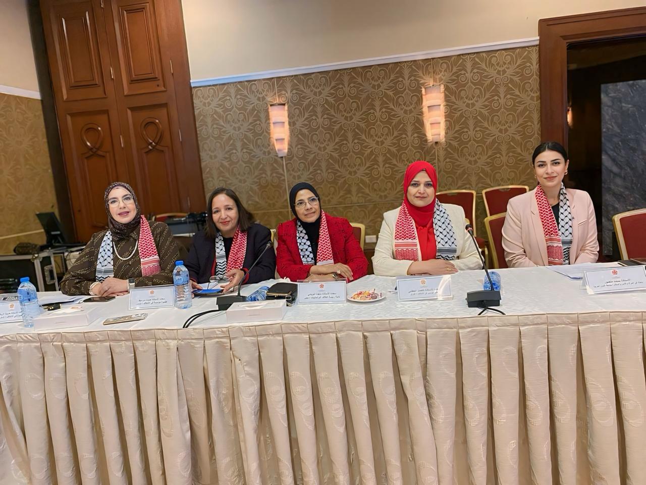 Panel of women smiling at the camera