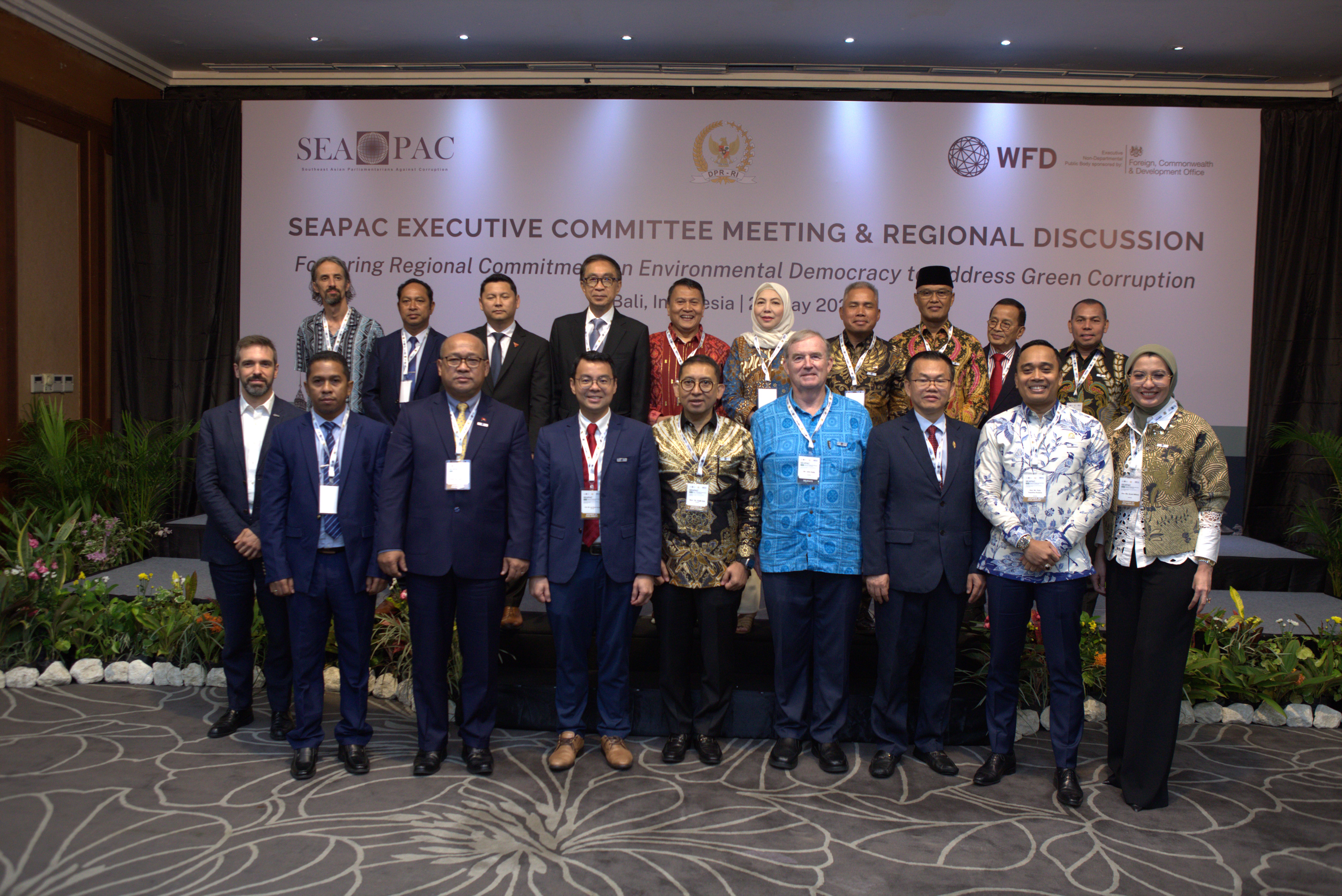 A group picture of panelist and participant during a conference in Indonesia