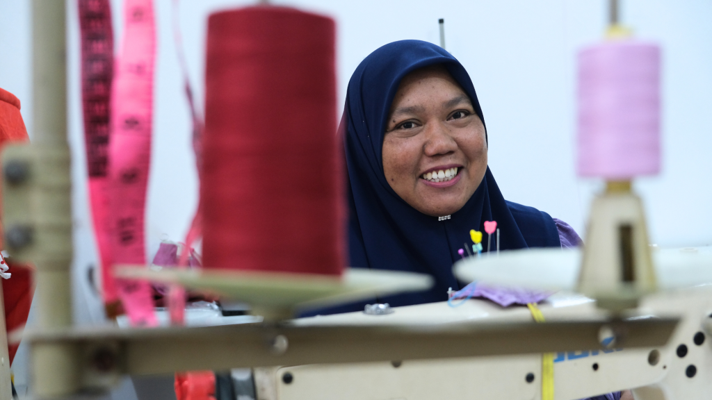 A member of Teja Station, a Civil Society Organisation from Malaysia learning sewing skills